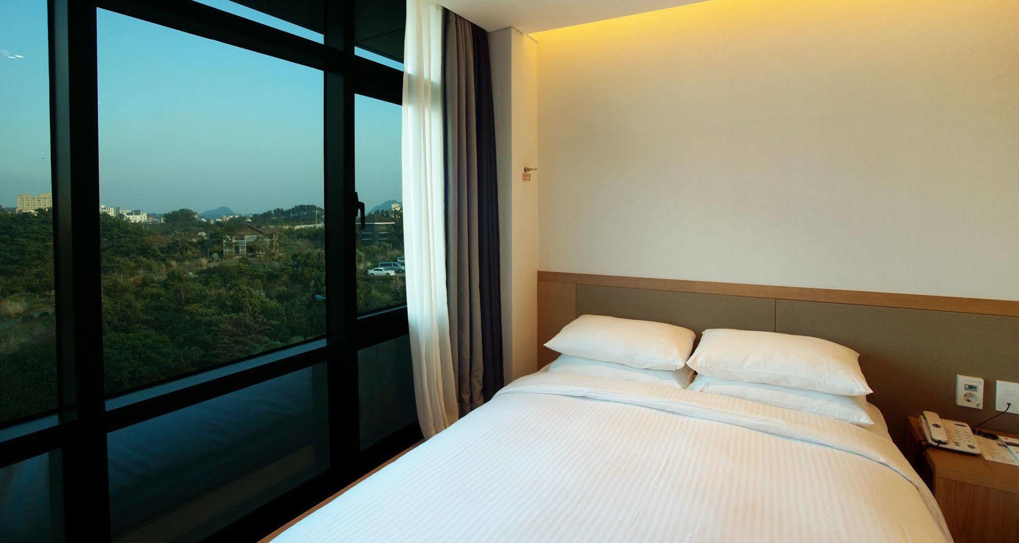 Jeju Poong Gyung Hotel Seogwipo Exterior foto