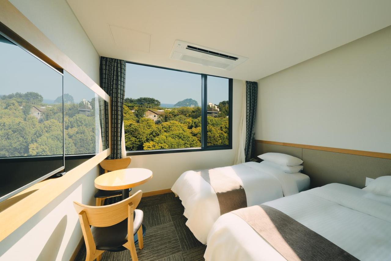 Jeju Poong Gyung Hotel Seogwipo Exterior foto