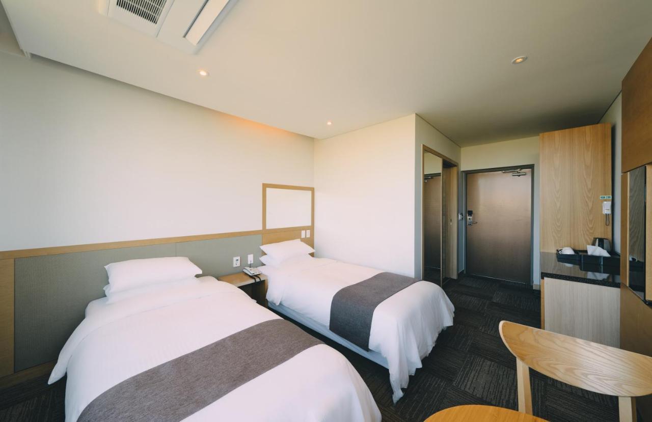Jeju Poong Gyung Hotel Seogwipo Exterior foto